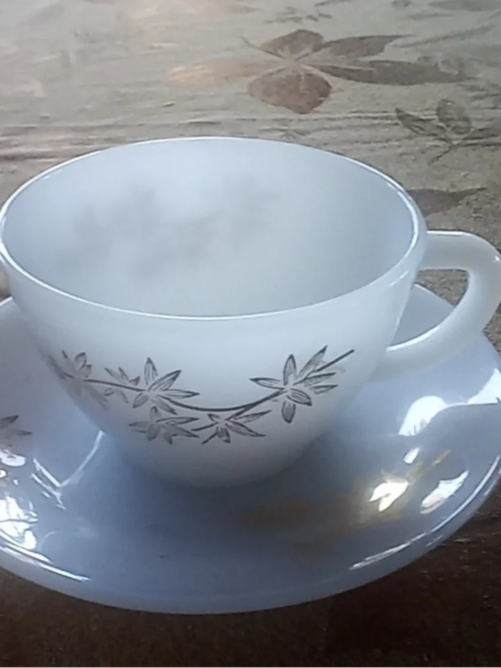 White Floral Porcelain Teacup and Saucer